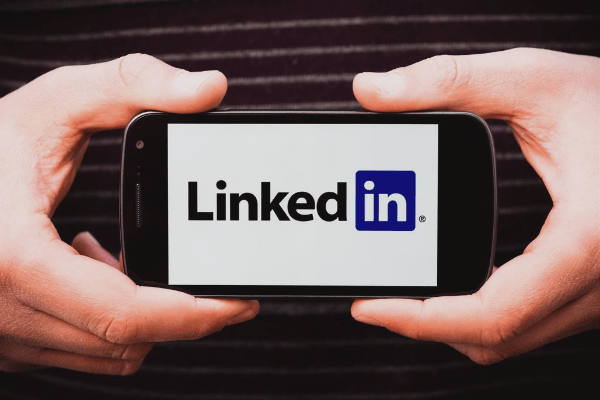 Linkedin logo image with hands